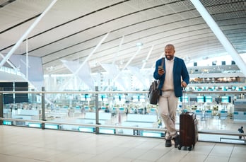 ALTOUR Client at the airport with suitcase